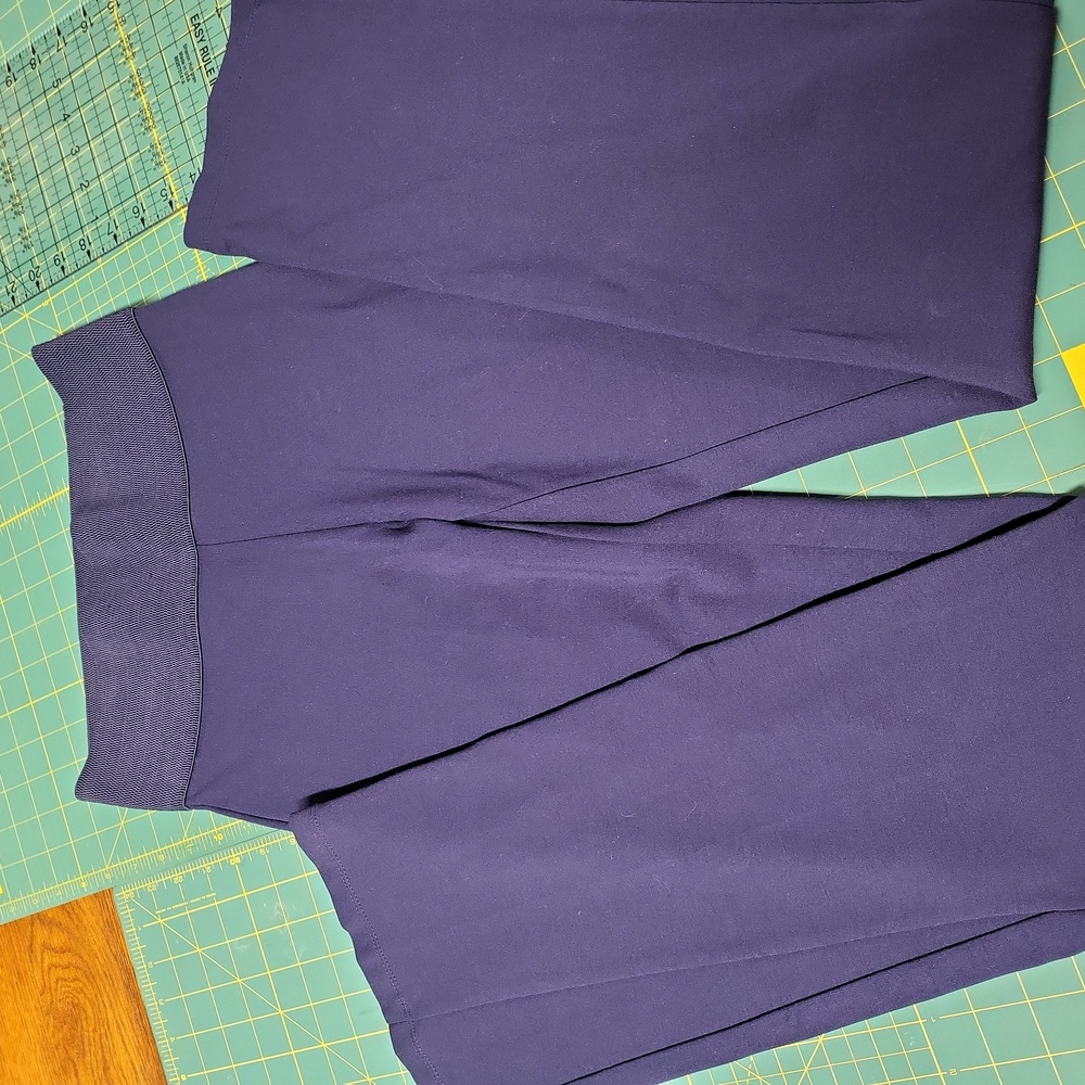 Nygard slims size 6 - 8 by Peter Nigard. Blue slight bell bottom